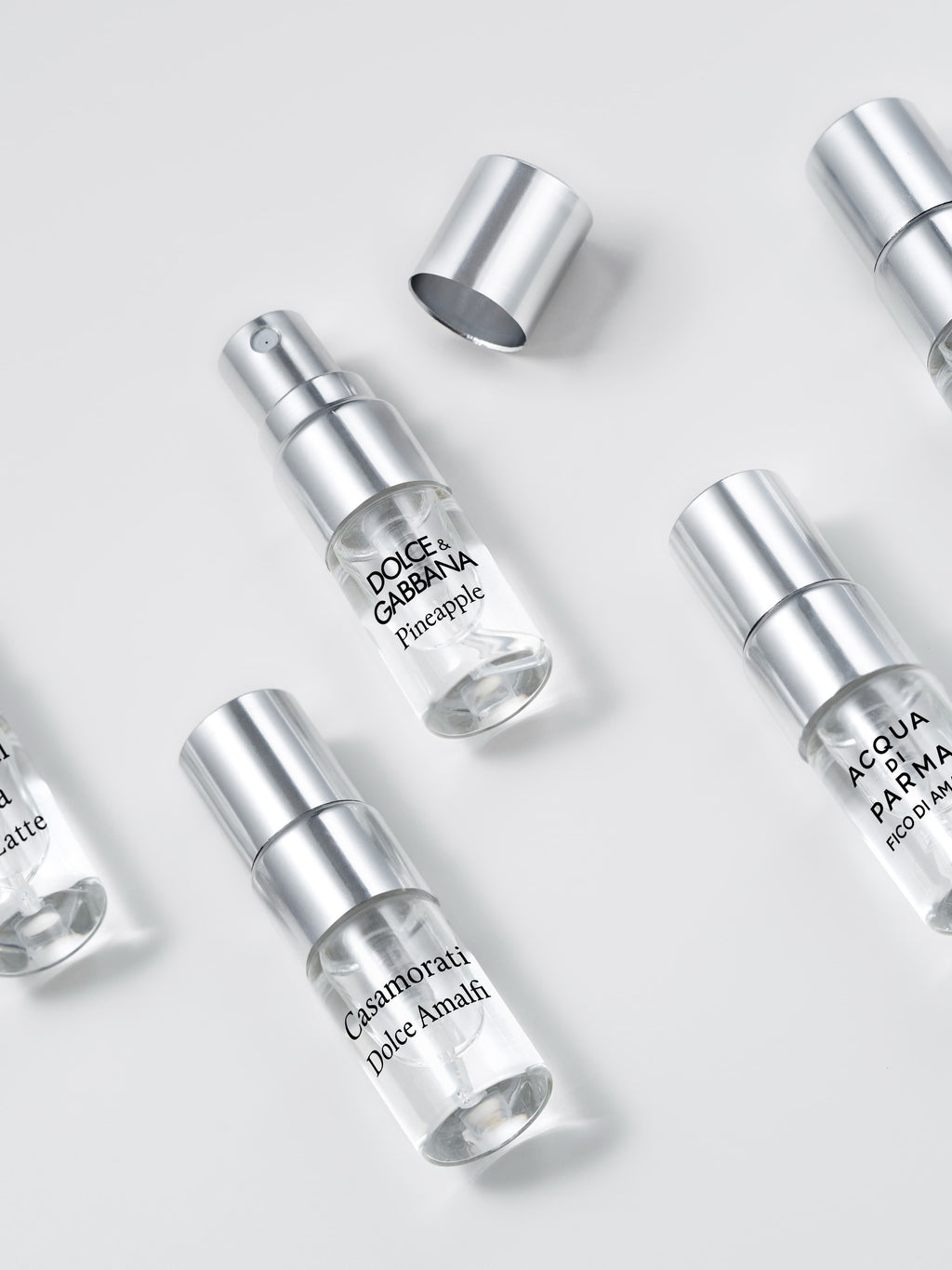 Bella Italia fragrance testers — close-up of 2 ml spray sample vials on white background